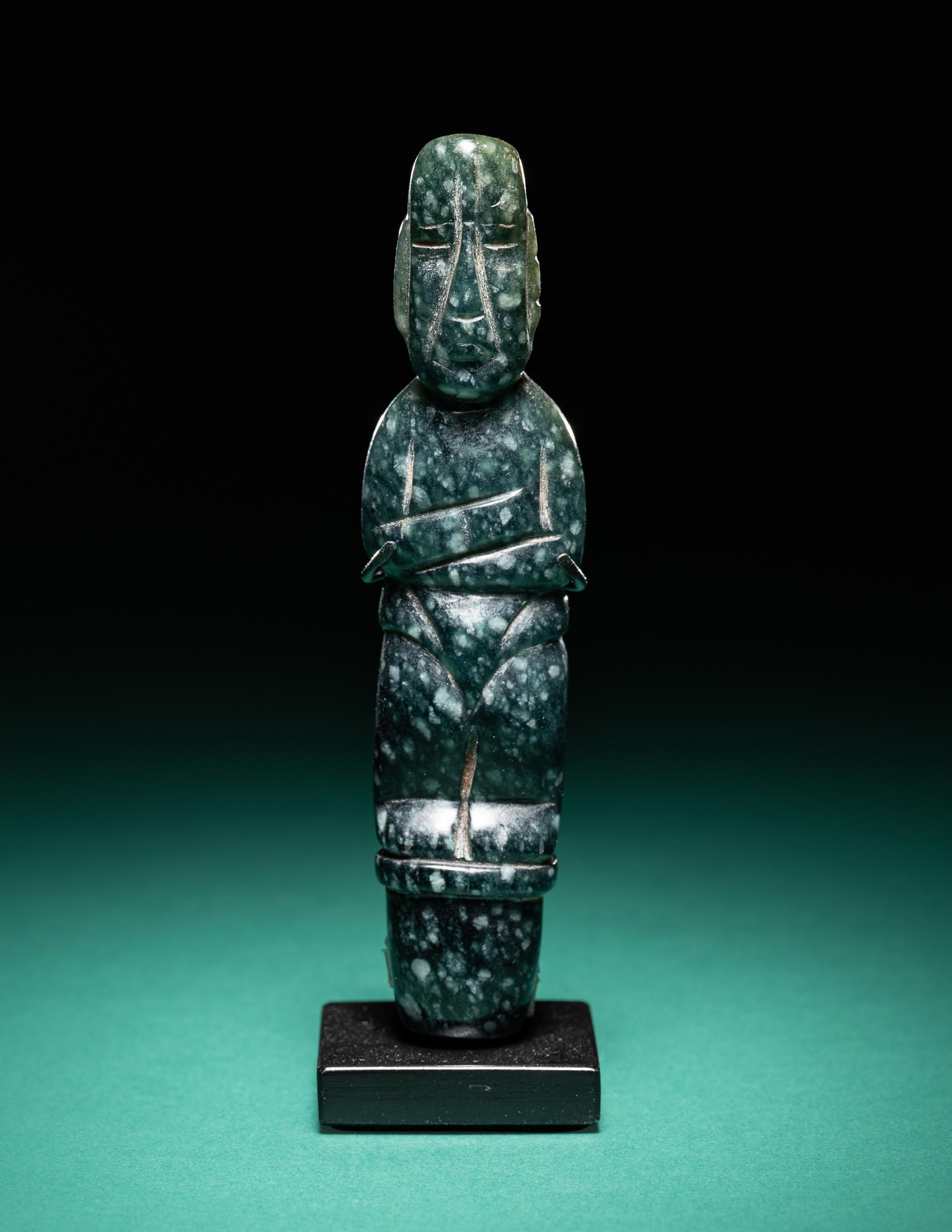 An Olmec Jade Pounding Figure