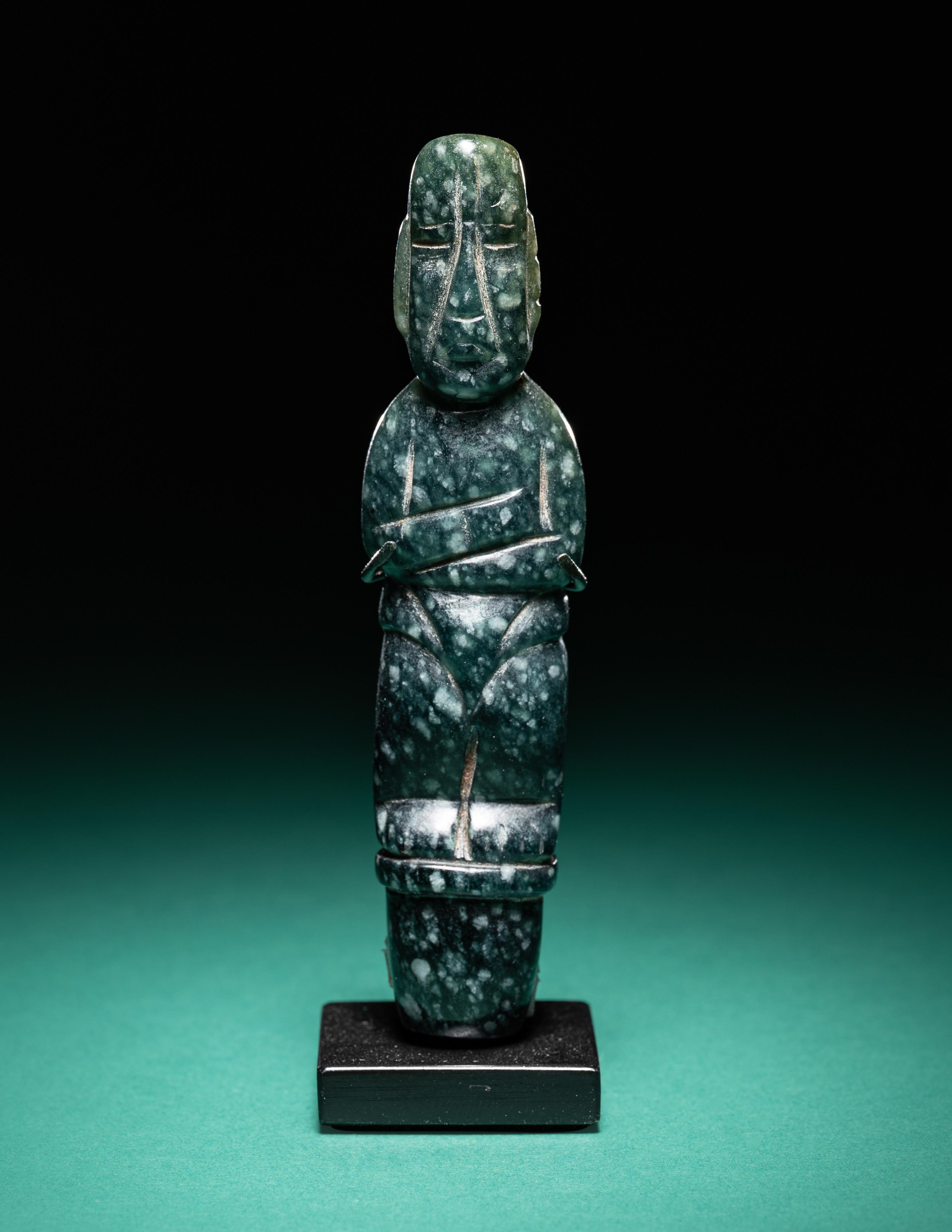 An Olmec Jade Pounding Figure
