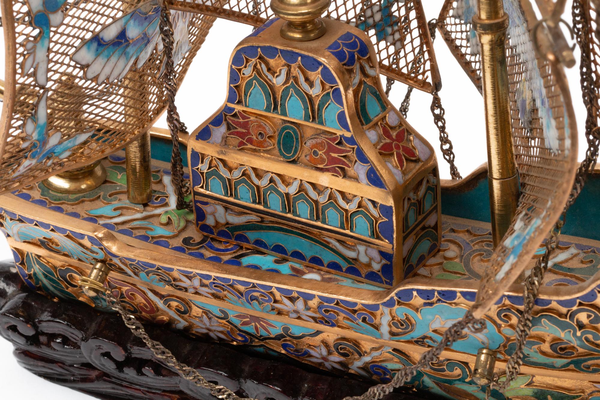 A Chinese Export Enameled Gilt Metal Model of a Ship