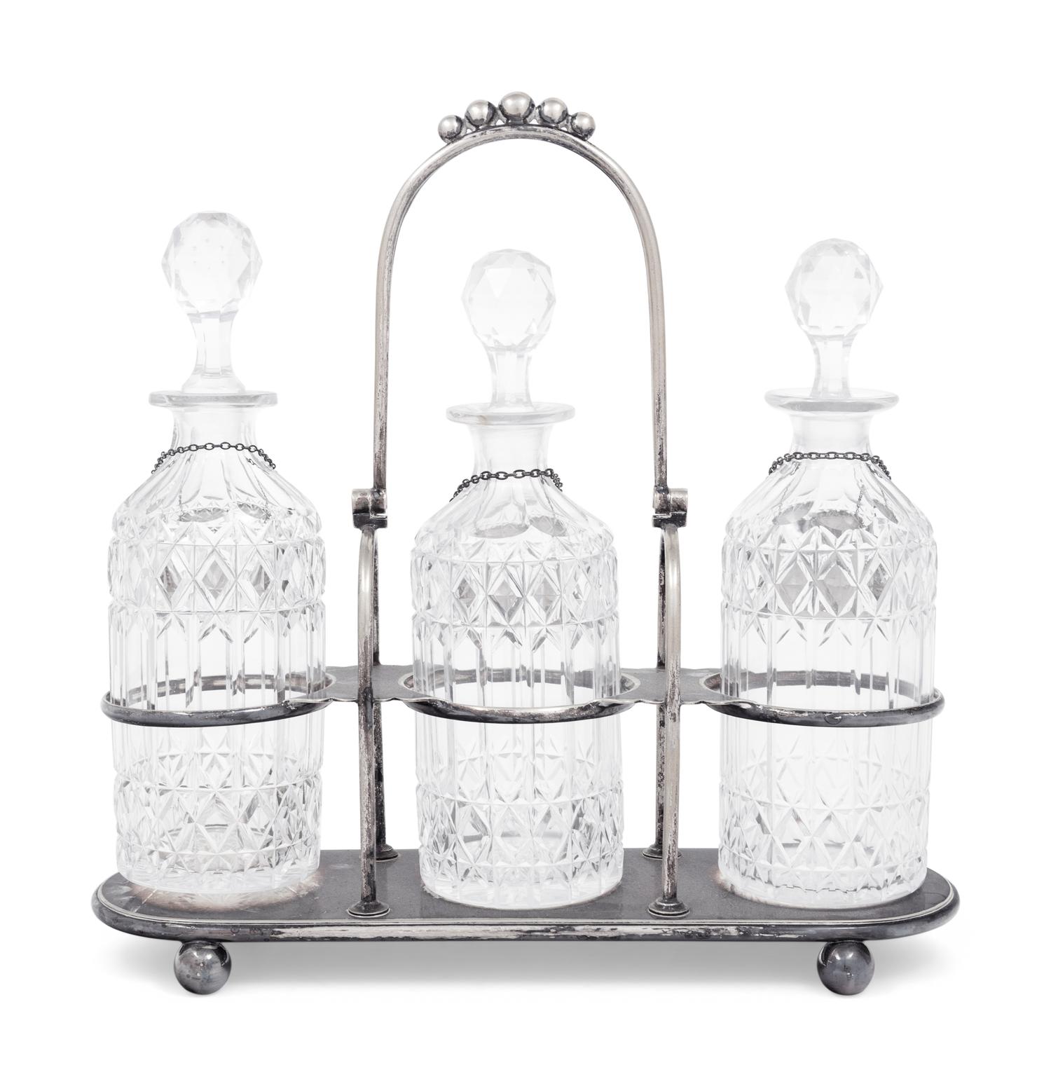 A Silver-Plate and Cut Glass Tantalus