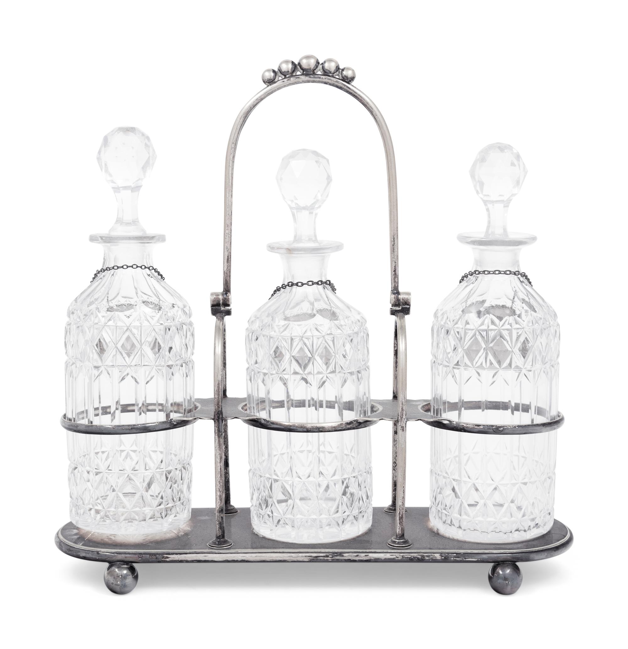 A Silver-Plate and Cut Glass Tantalus