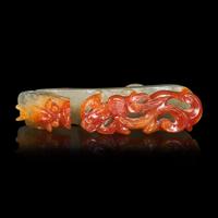 A Chinese Russet and Pale Celadon Jadeite "Dragons" Belthook 翡翠龍紋帶鉤