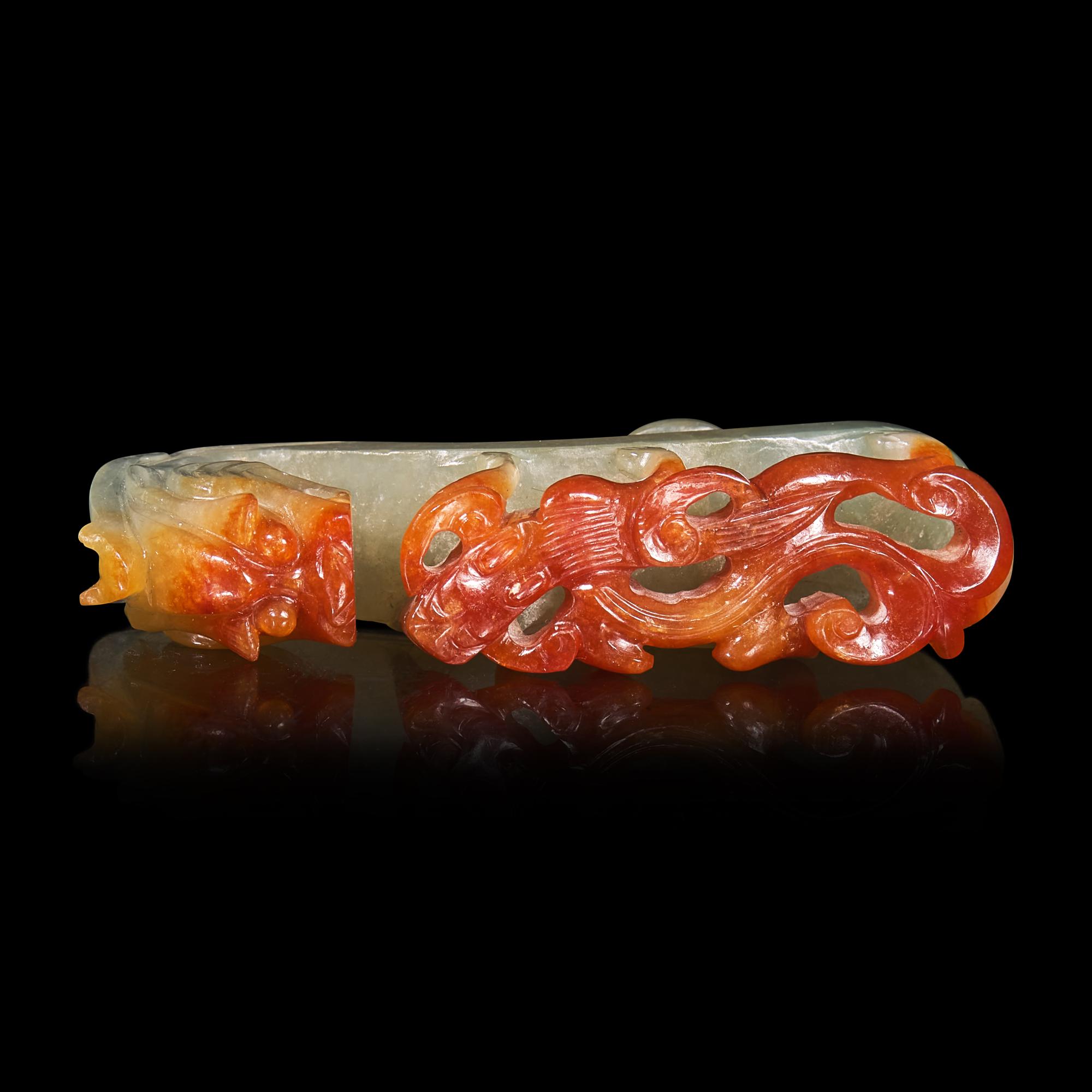 A Chinese Russet and Pale Celadon Jadeite "Dragons" Belthook 翡翠龍紋帶鉤