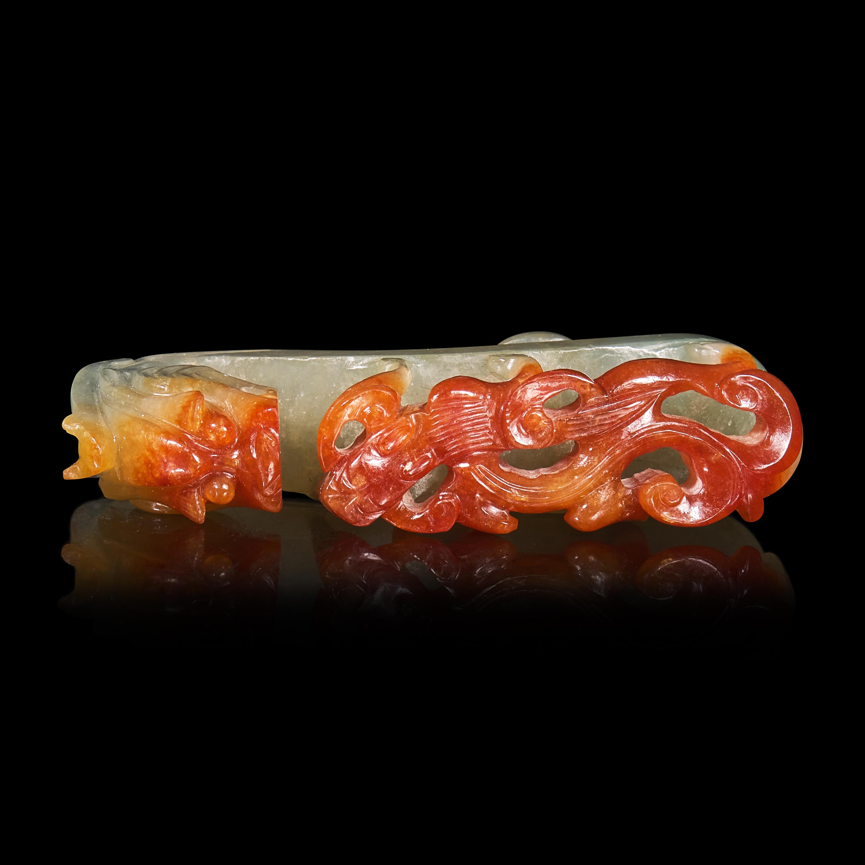 A Chinese Russet and Pale Celadon Jadeite "Dragons" Belthook 翡翠龍紋帶鉤