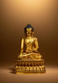 A Gilt Bronze Figure of Shakyamuni Buddha