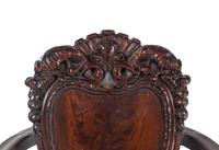 A Baroque Revival Carved Mahogany Armchair