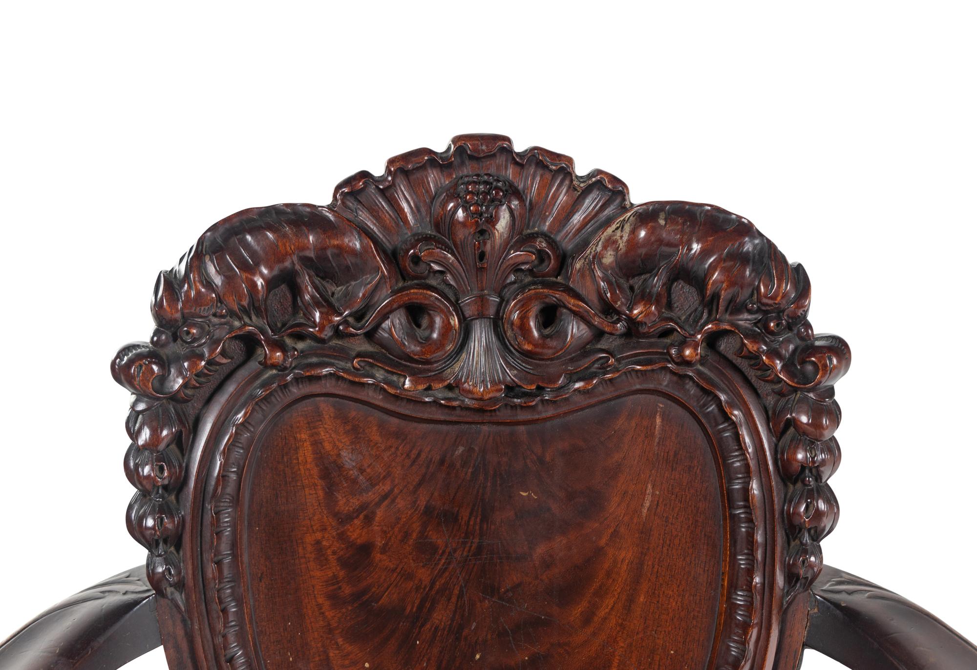A Baroque Revival Carved Mahogany Armchair