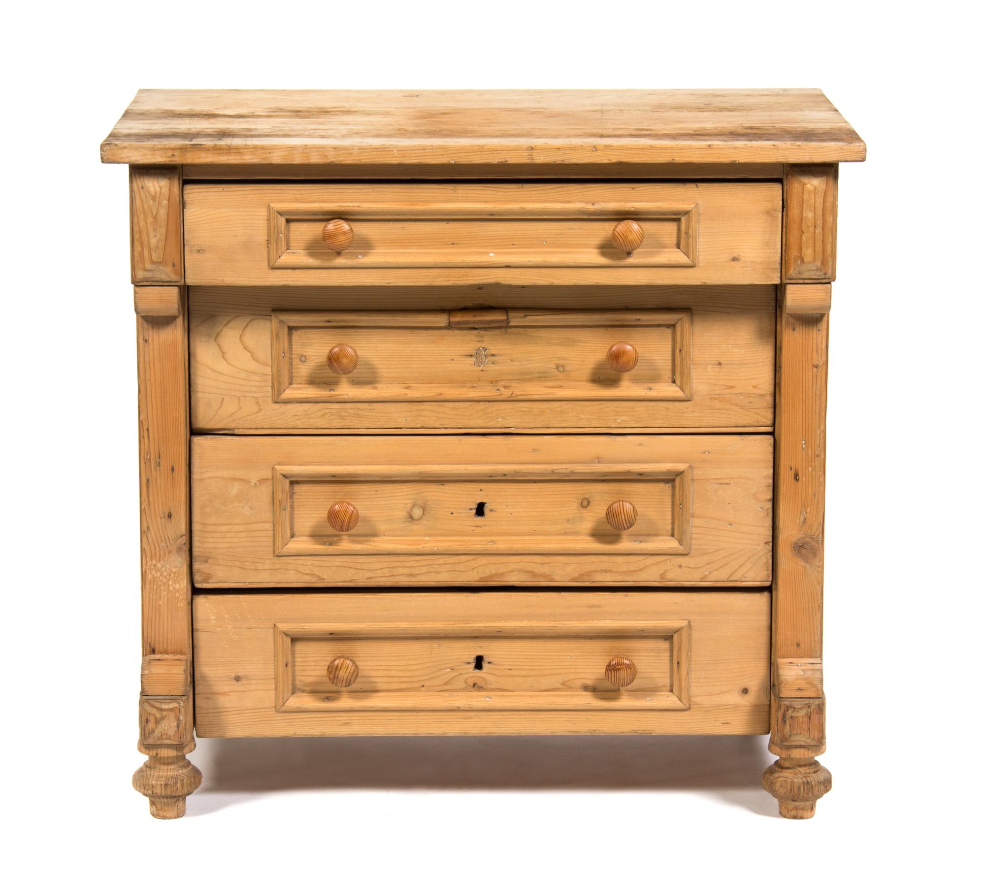 An Irish Pine Low Chest of Drawers Height 31 1/4 x width 33 1/2 x depth 21 1/8 inches. — 19TH/20TH CENTURY