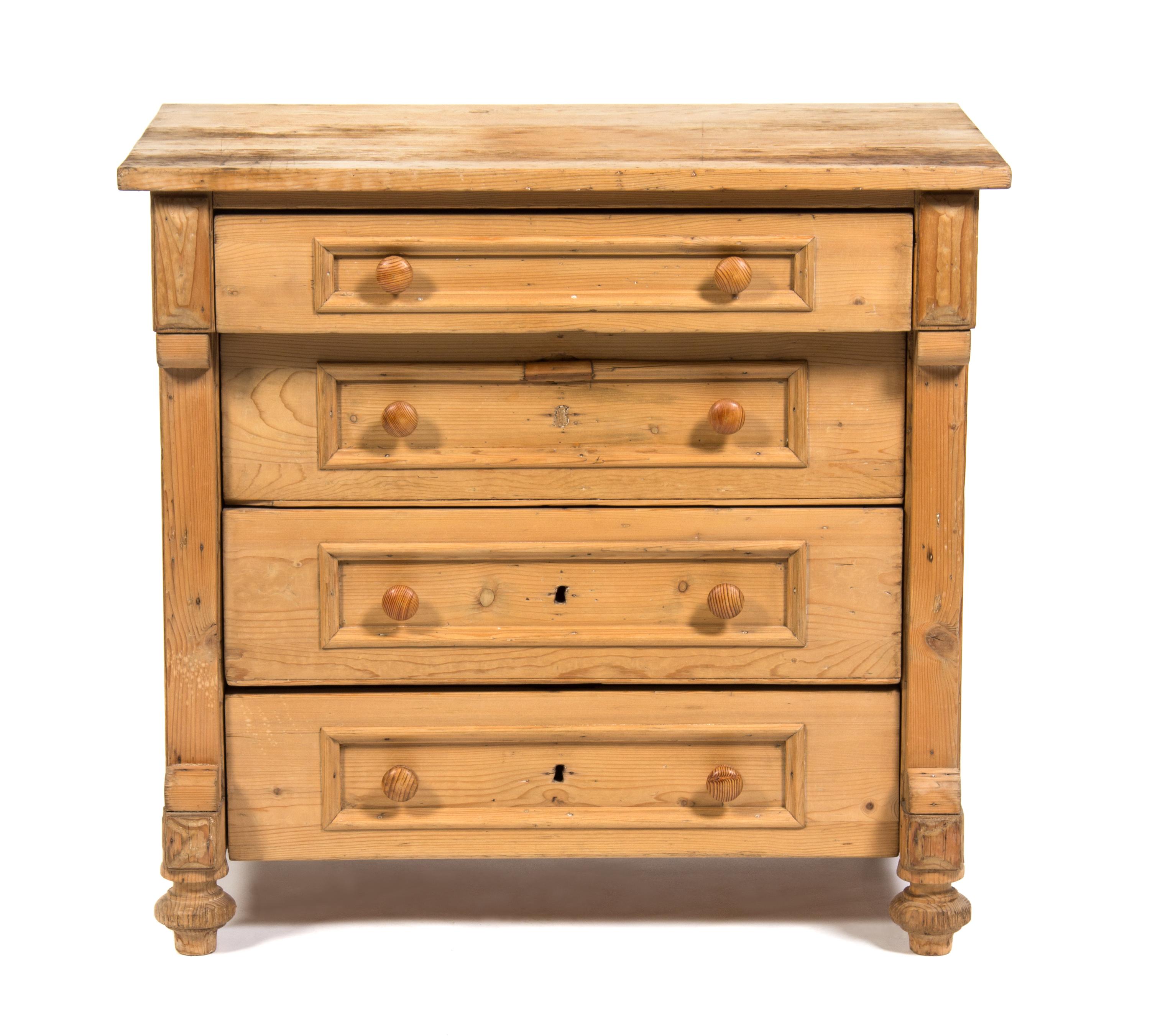 An Irish Pine Low Chest of Drawers Height 31 1/4 x width 33 1/2 x depth 21 1/8 inches. — 19TH/20TH CENTURY