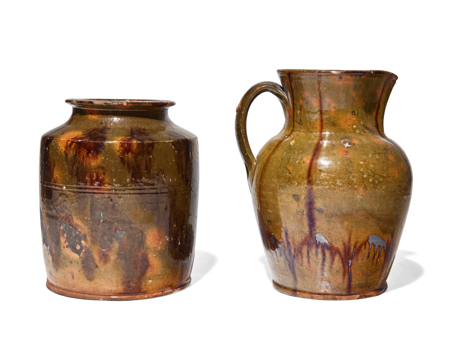A Gonic Glazed and Manganese and Slip-Decorated Redware Pitcher, 19th Century