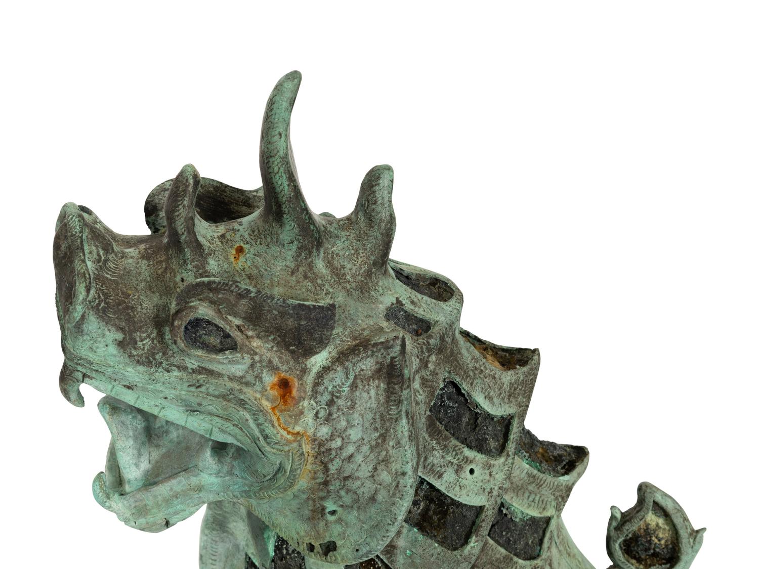 A Pair of Large Patinated Bronze Temple Lions