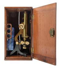An English Brass and Black Lacquered Binocular Microscope Height 13 1/4 inches. — LOFTUS, LONDON, EARLY 20TH CENTURY