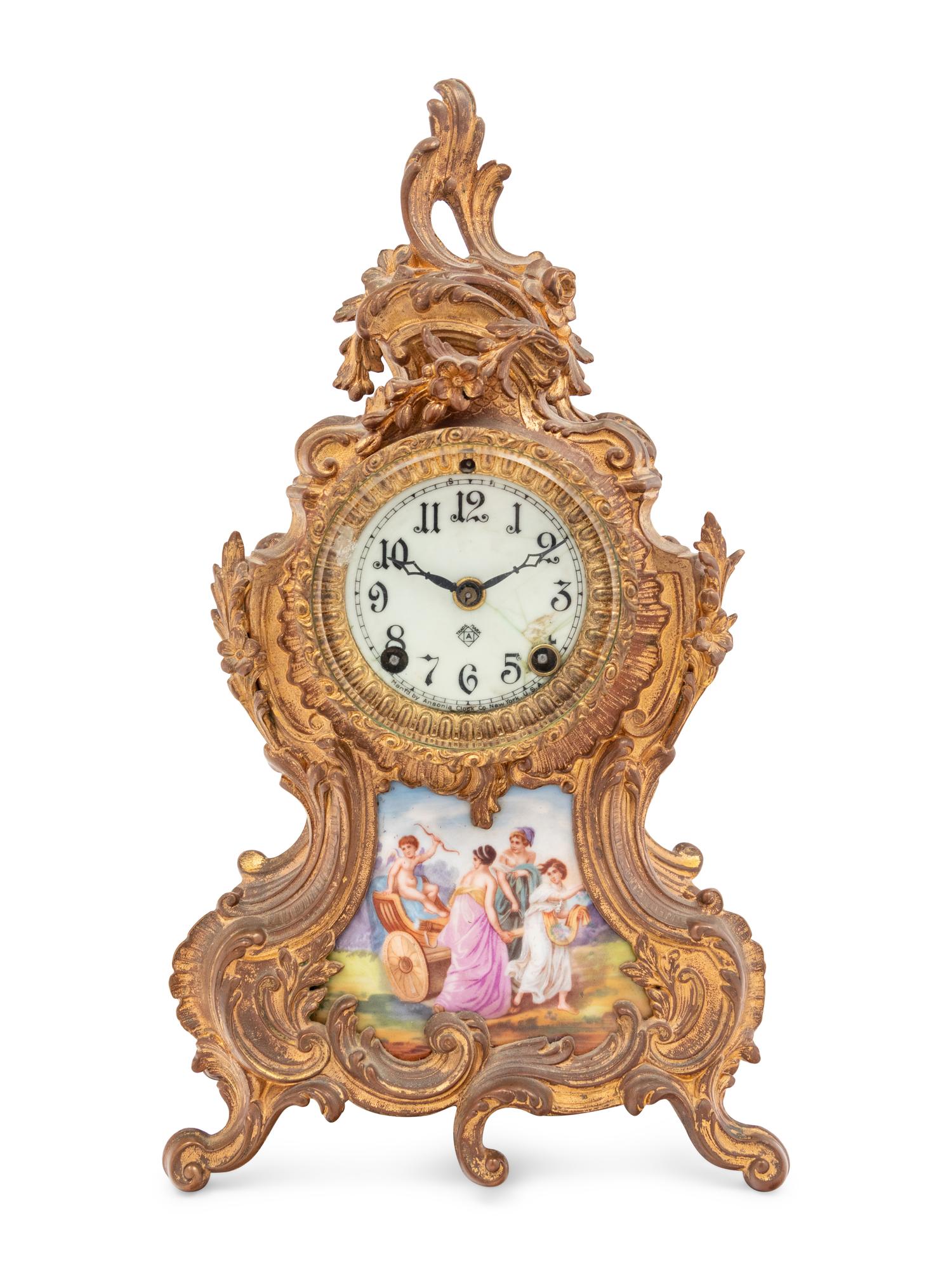 An Ansonia Porcelain and Gilt Metal Mantel Clock in the Louis XV Taste