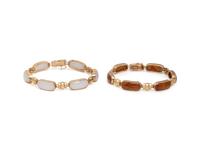 TWO YELLOW GOLD AND JADE BRACELETS