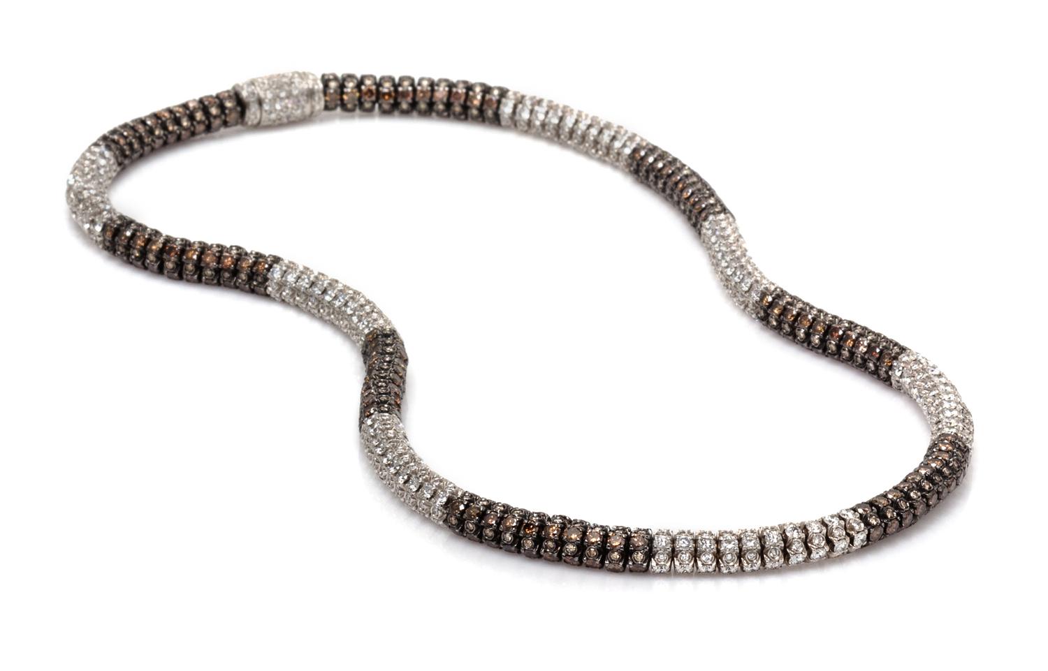An 18 Karat White Gold, Colored Diamond and Diamond Necklace, 41.50 dwts.