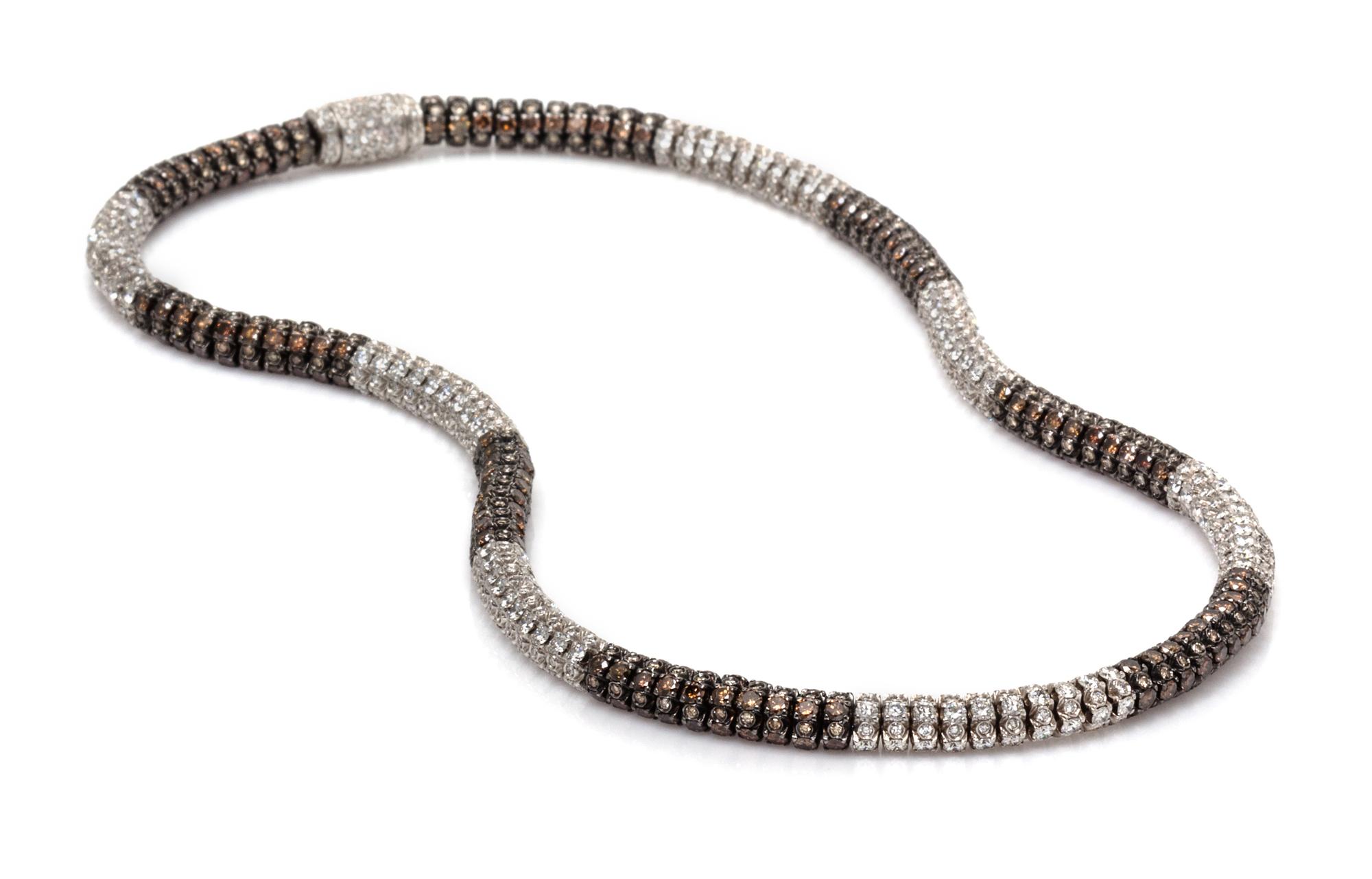 An 18 Karat White Gold, Colored Diamond and Diamond Necklace, 41.50 dwts.