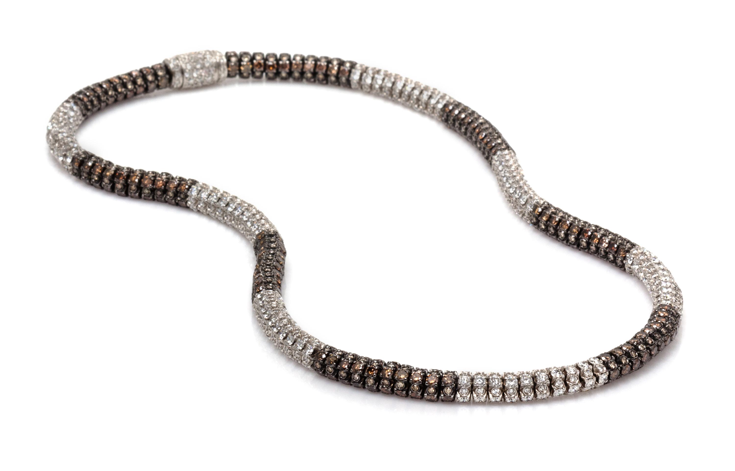 An 18 Karat White Gold, Colored Diamond and Diamond Necklace, 41.50 dwts.