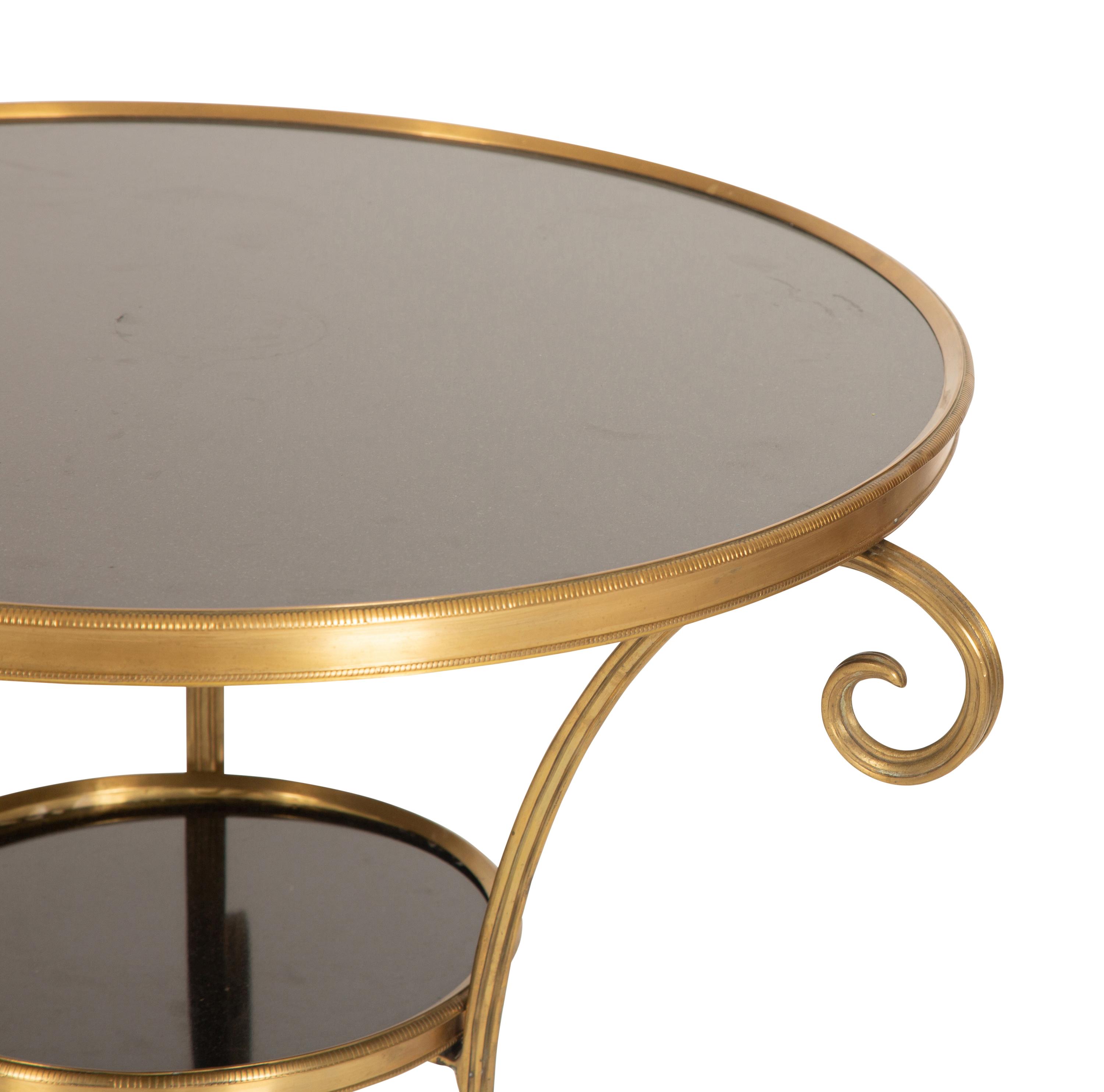An Empire Style Gilt Metal and Black Granite Guéridon