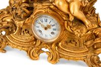 A French Gilt Bronze Figural Mantel Clock