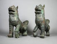 A Pair of Chinese Bronze Fu Dogs, Height 44 inches.