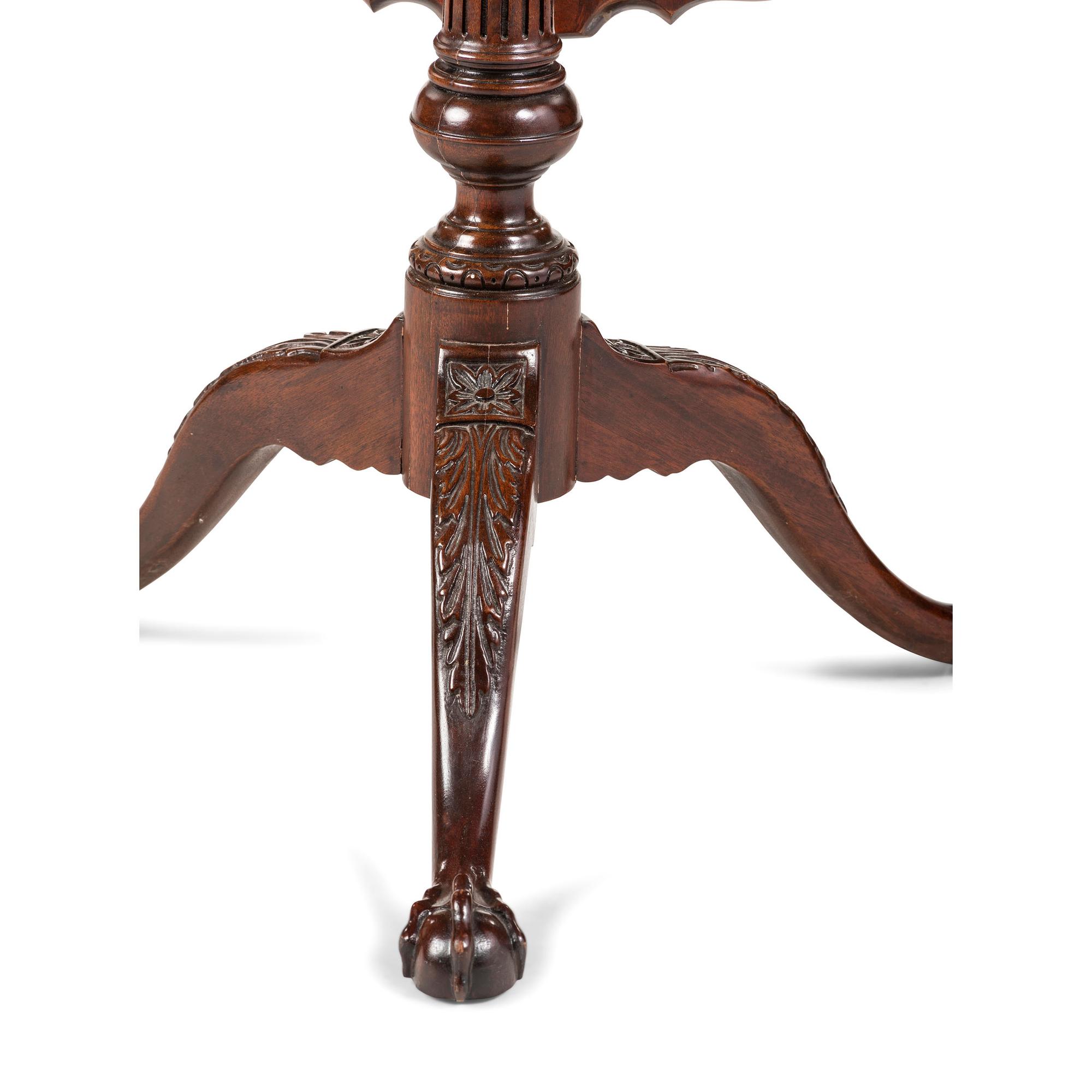 A Chippendale Style Carved Mahogany Pie-Crust Tilt-Top Tea Table