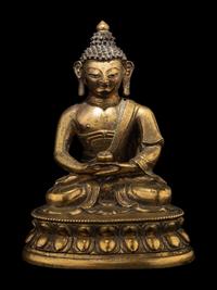A Small Tibetan Gilt Bronze Figure of Medicine Buddha