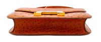 An Hermès Cognac Ostrich Constance Bag, 7" H x 9" W x 2" D; Strap drop: 14" or 8.5".