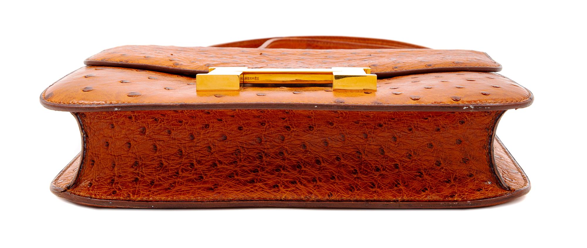 An Hermès Cognac Ostrich Constance Bag, 7" H x 9" W x 2" D; Strap drop: 14" or 8.5".