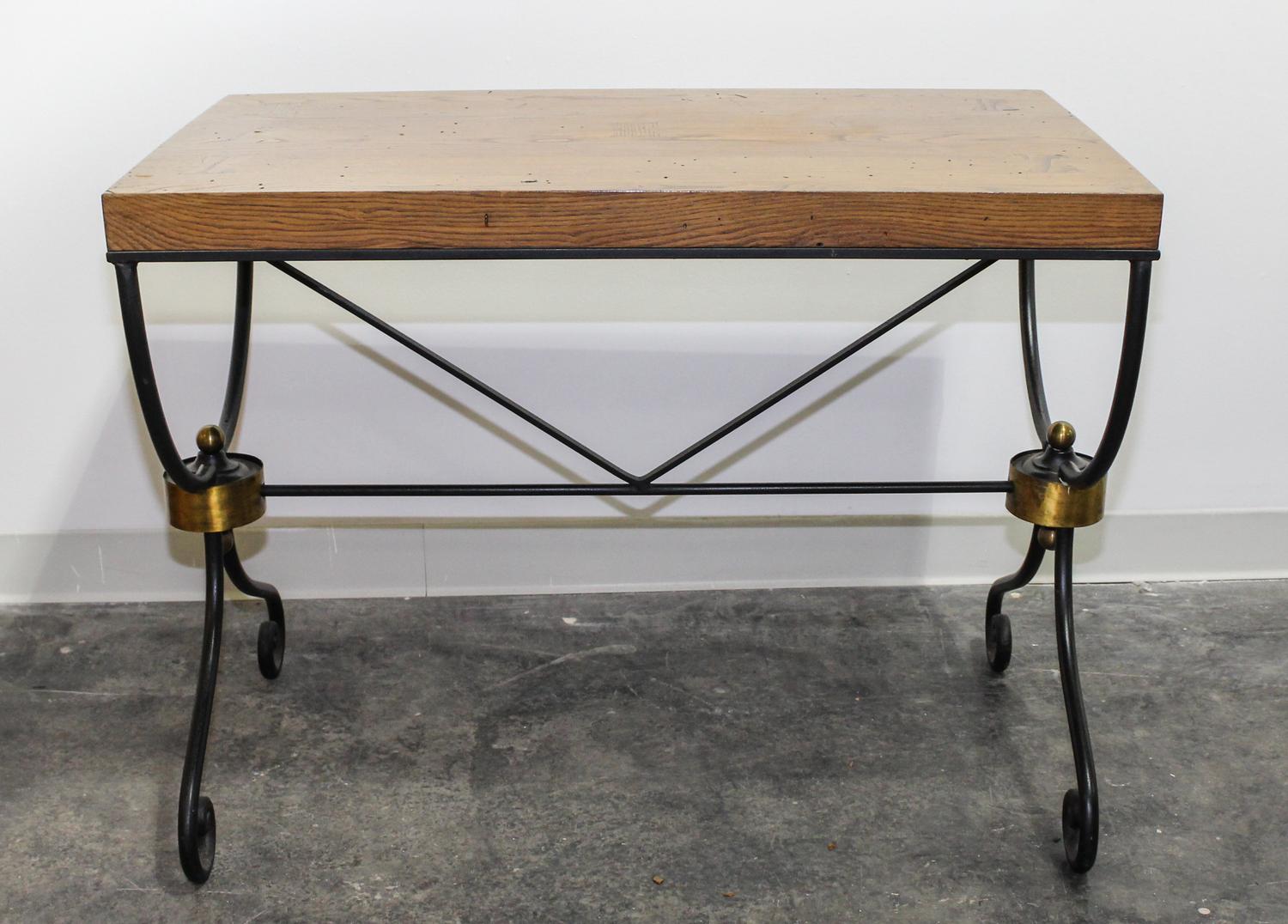 An Art Deco Style Iron and Wood Console Height 28 x width 37 x depth 21 inches