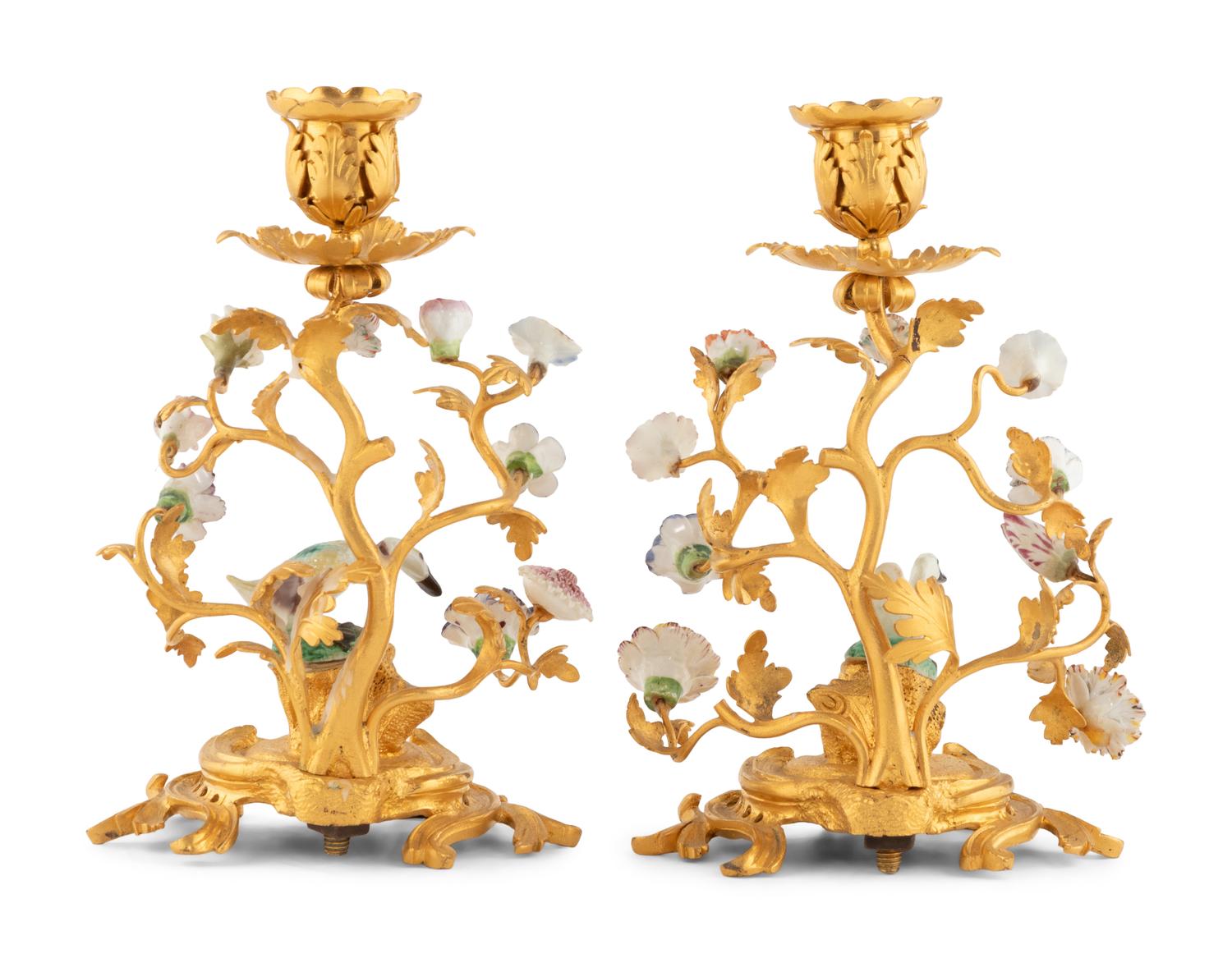 A Pair of French Gilt Bronze and Porcelain Candlesticks