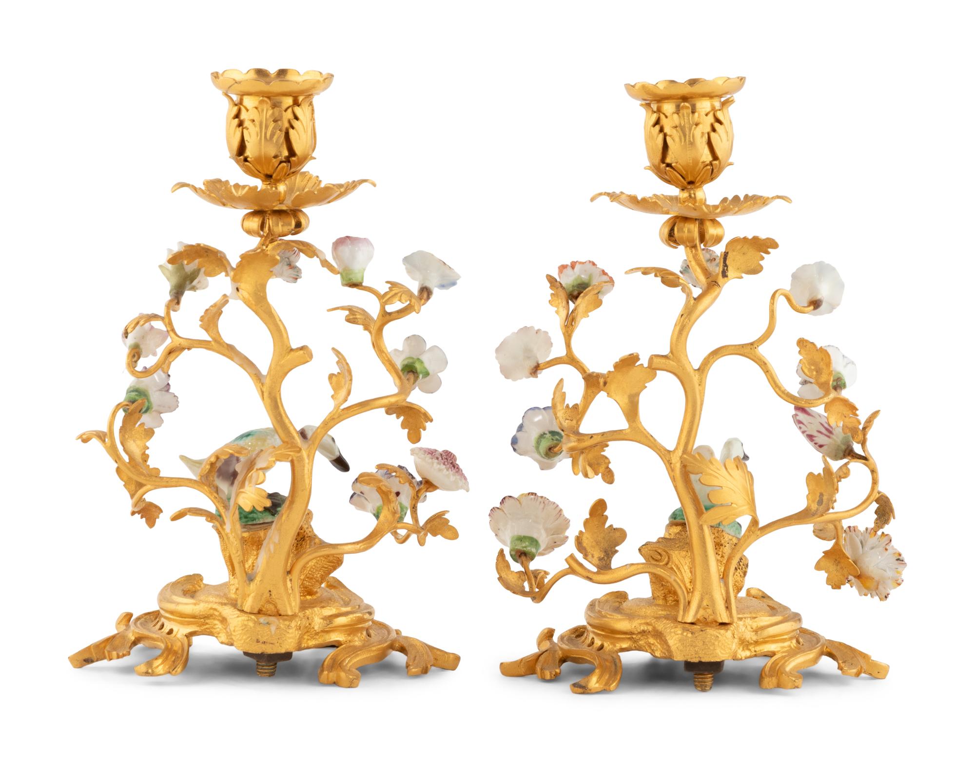 A Pair of French Gilt Bronze and Porcelain Candlesticks