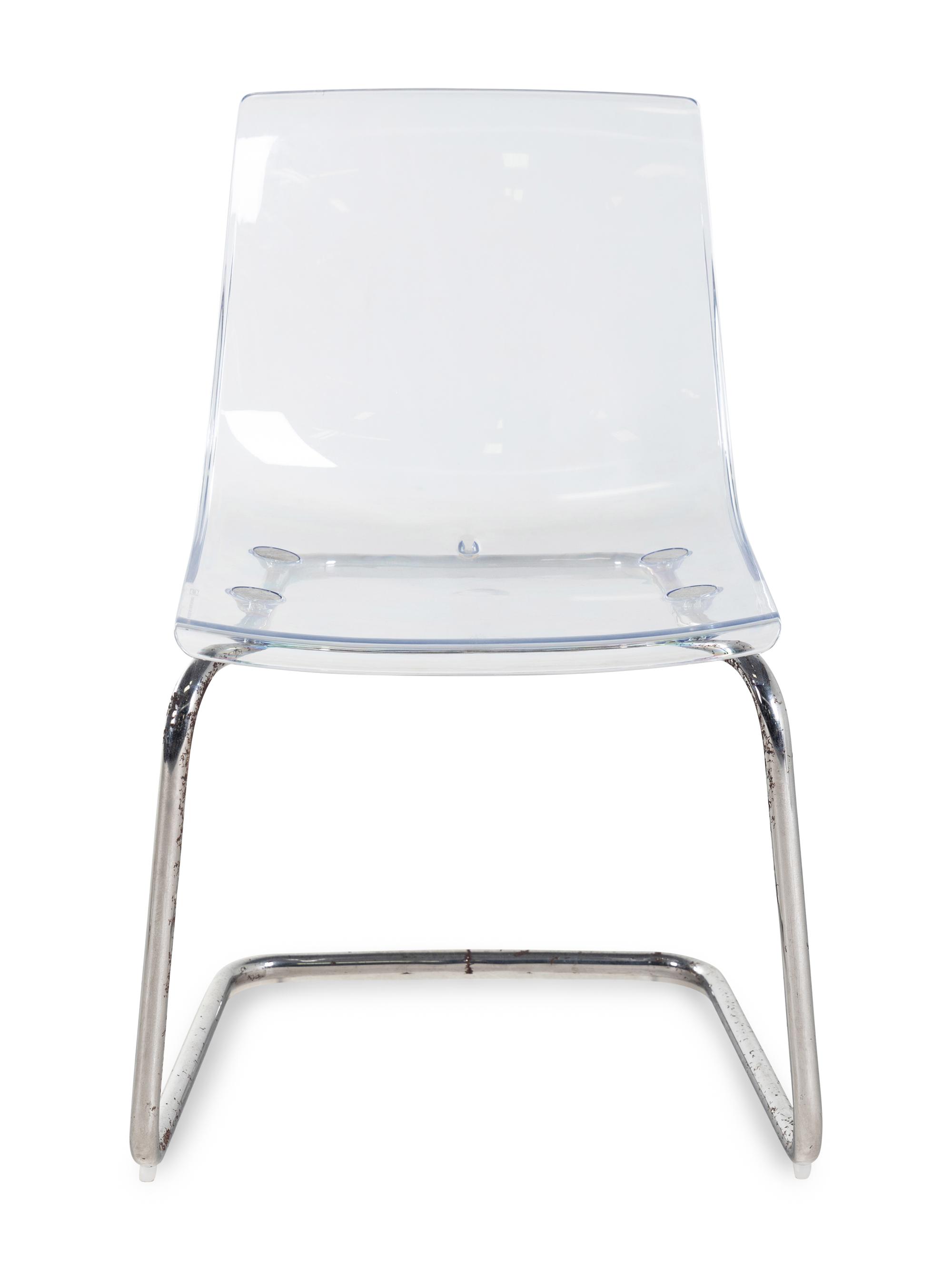 A Set of Three Contemporary Acrylic Nesting Tables and a Pair of Similar Side Chairs