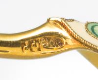 A Group of Five Russian Silver-Gilt and Enamel Teaspoons, Mark of Fedor Ruckert, Moscow, early 20th century, each having a green enamel