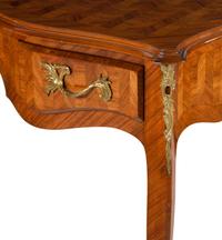 A Louis XV Style Gilt Metal Mounted Parquetry Desk