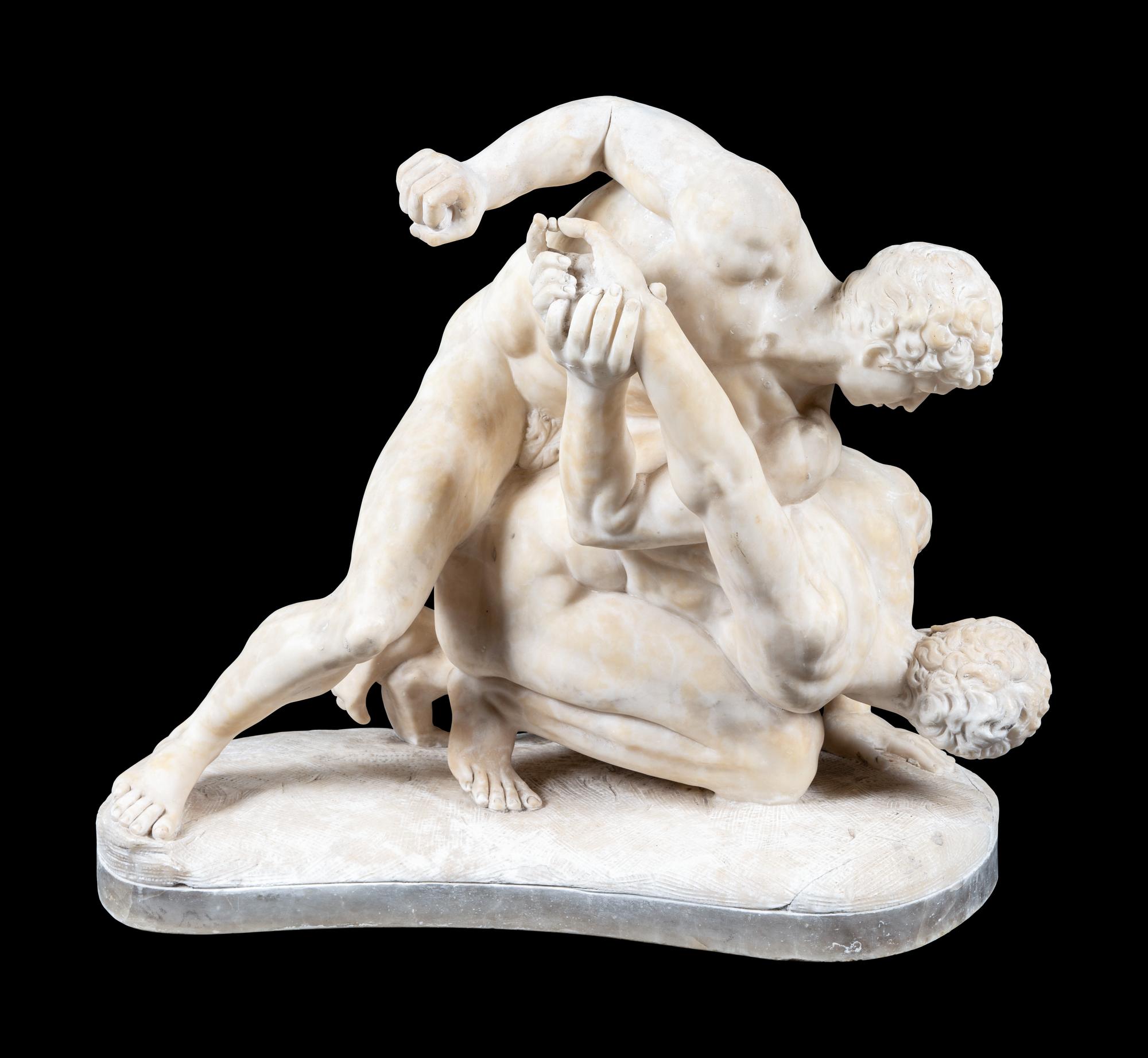 A Carved Alabaster Figural Group of The Wrestlers After the Antique