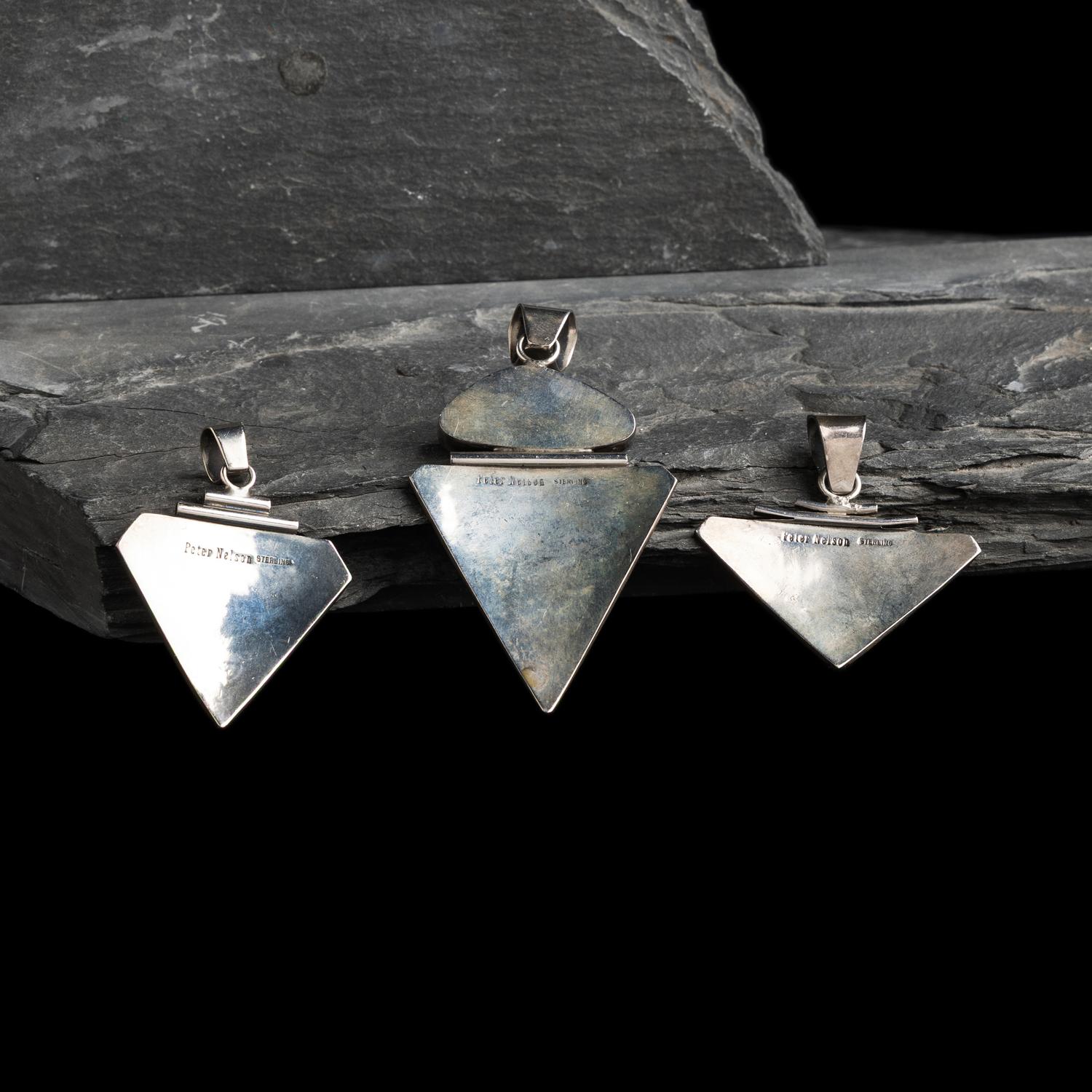 Peter Nelson (Diné, b. 1954) — Collection of Sterling Silver Cuff Bracelets and Pendants