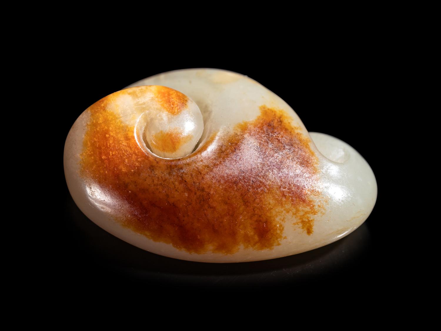 A Pale Celadon and Russet Jade Carving of a Lingzhi Fungus
