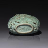 A Chinese Turquoise-Glazed Reticulated Porcelain "Dragon" Snuff Bottle, Qing Dynasty, Second Half 19th Century — 清晚期 松石釉鏤雕龍戲珠圖鼻煙壺