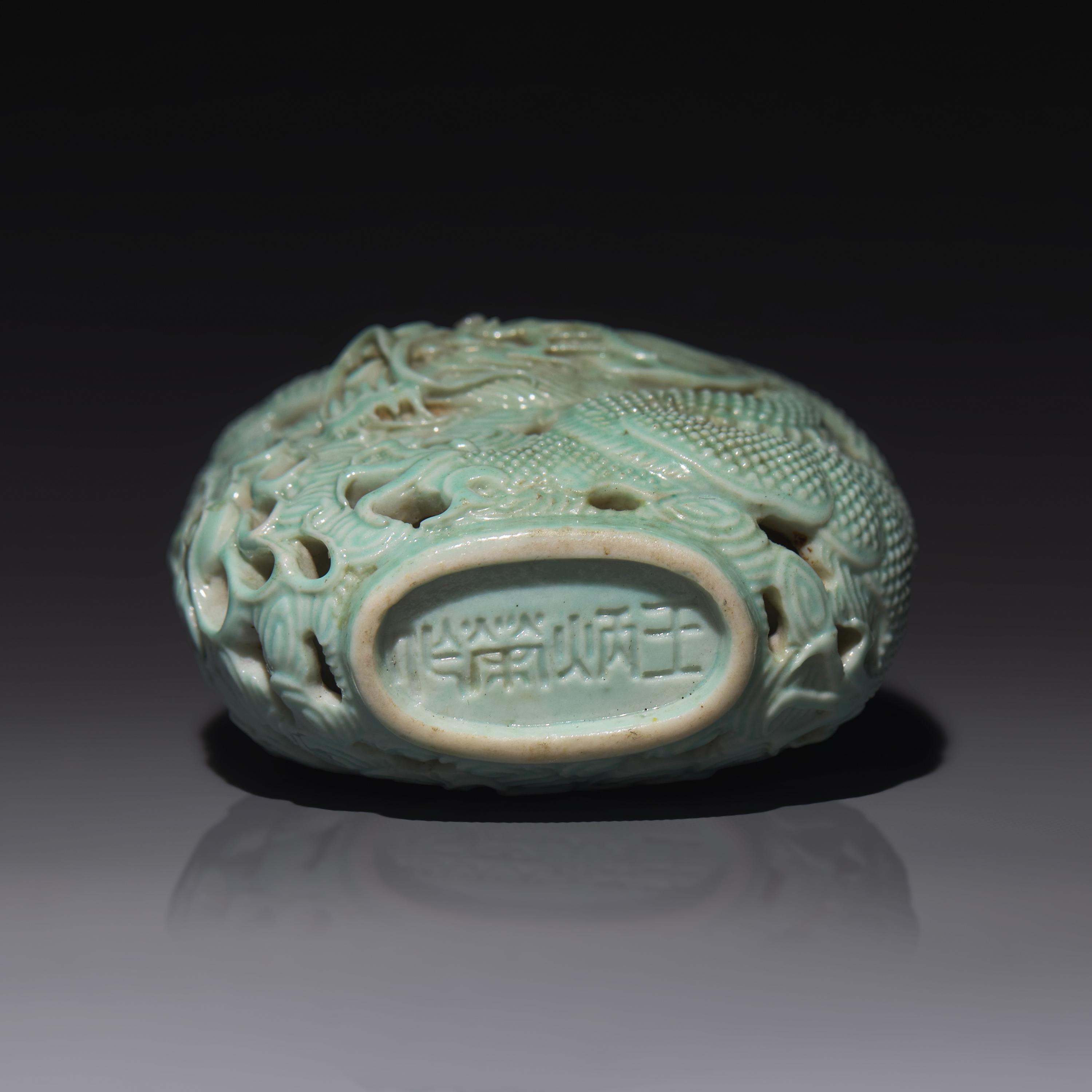 A Chinese Turquoise-Glazed Reticulated Porcelain "Dragon" Snuff Bottle, Qing Dynasty, Second Half 19th Century