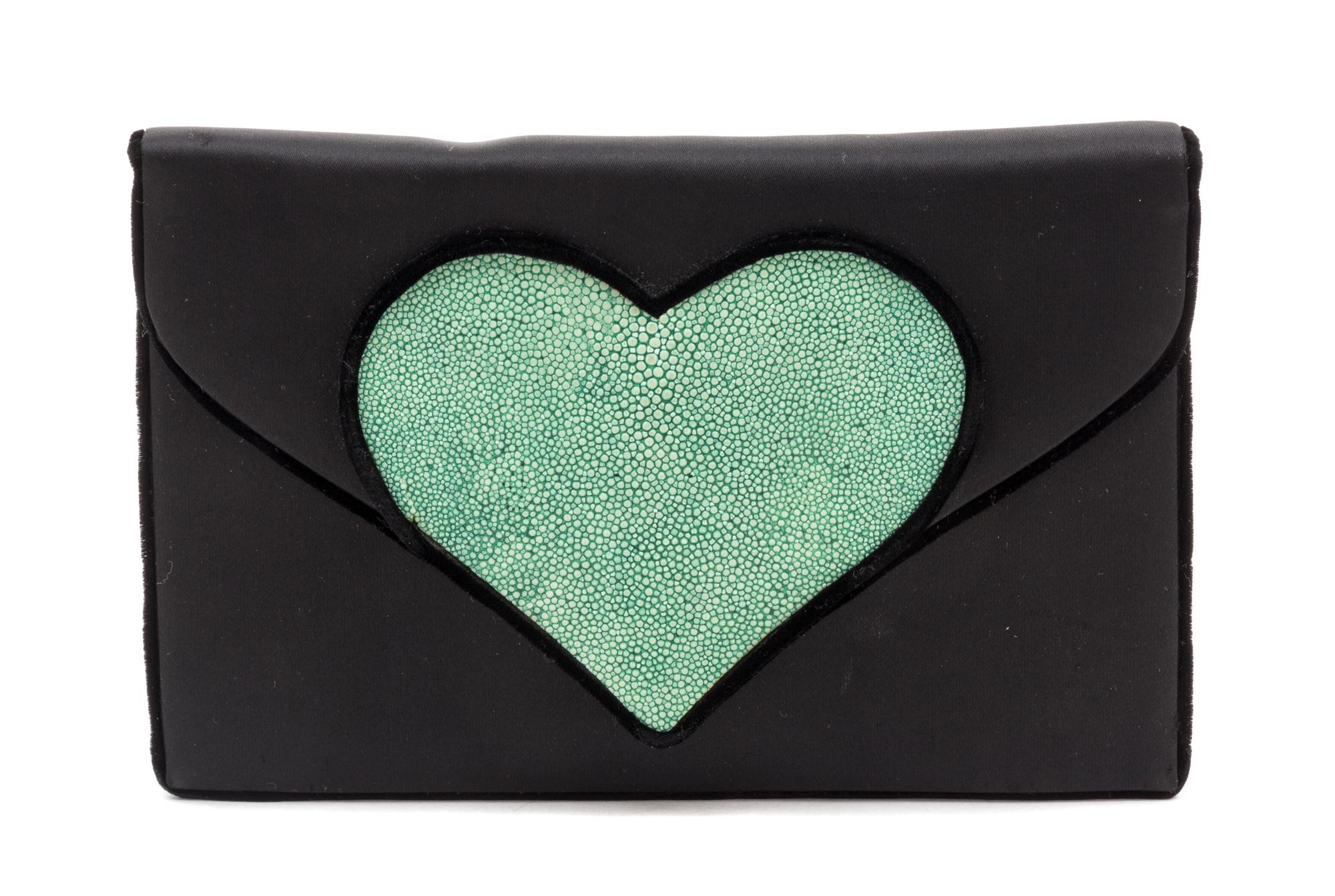 A Renaud Pellegrino Black Satin Clutch, 8" x 5.25" x 1".