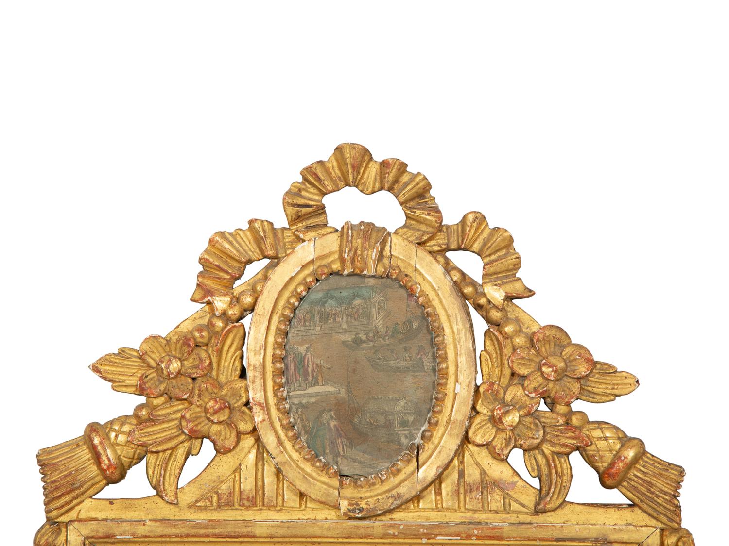 A Pair of Italian Carved Giltwood Mirrors
