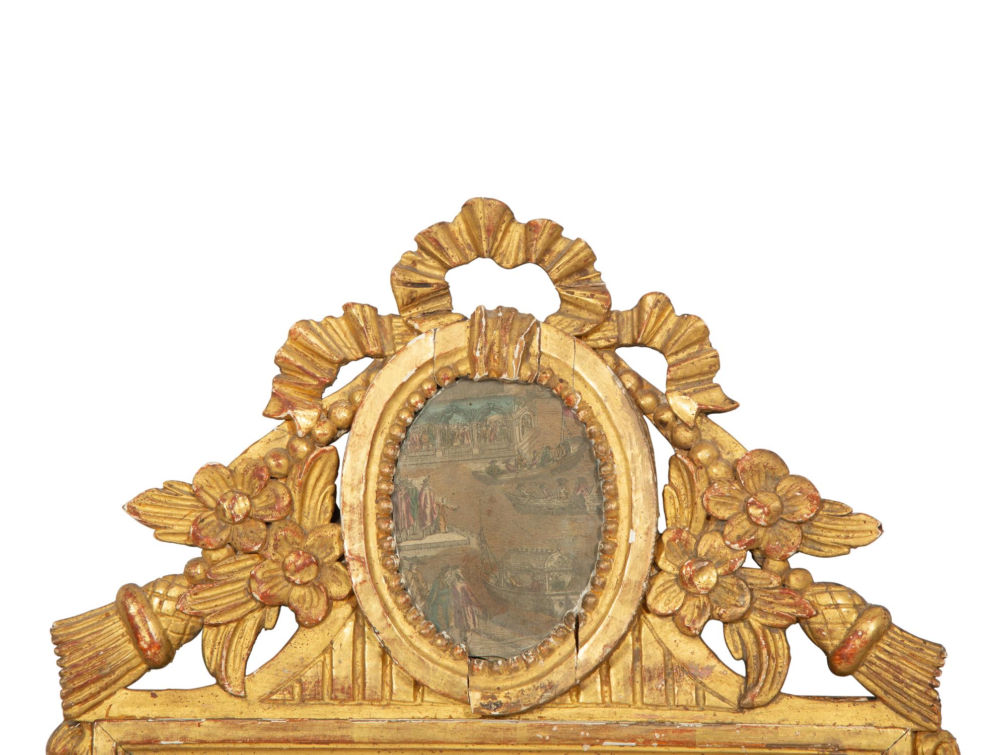 A Pair of Italian Carved Giltwood Mirrors