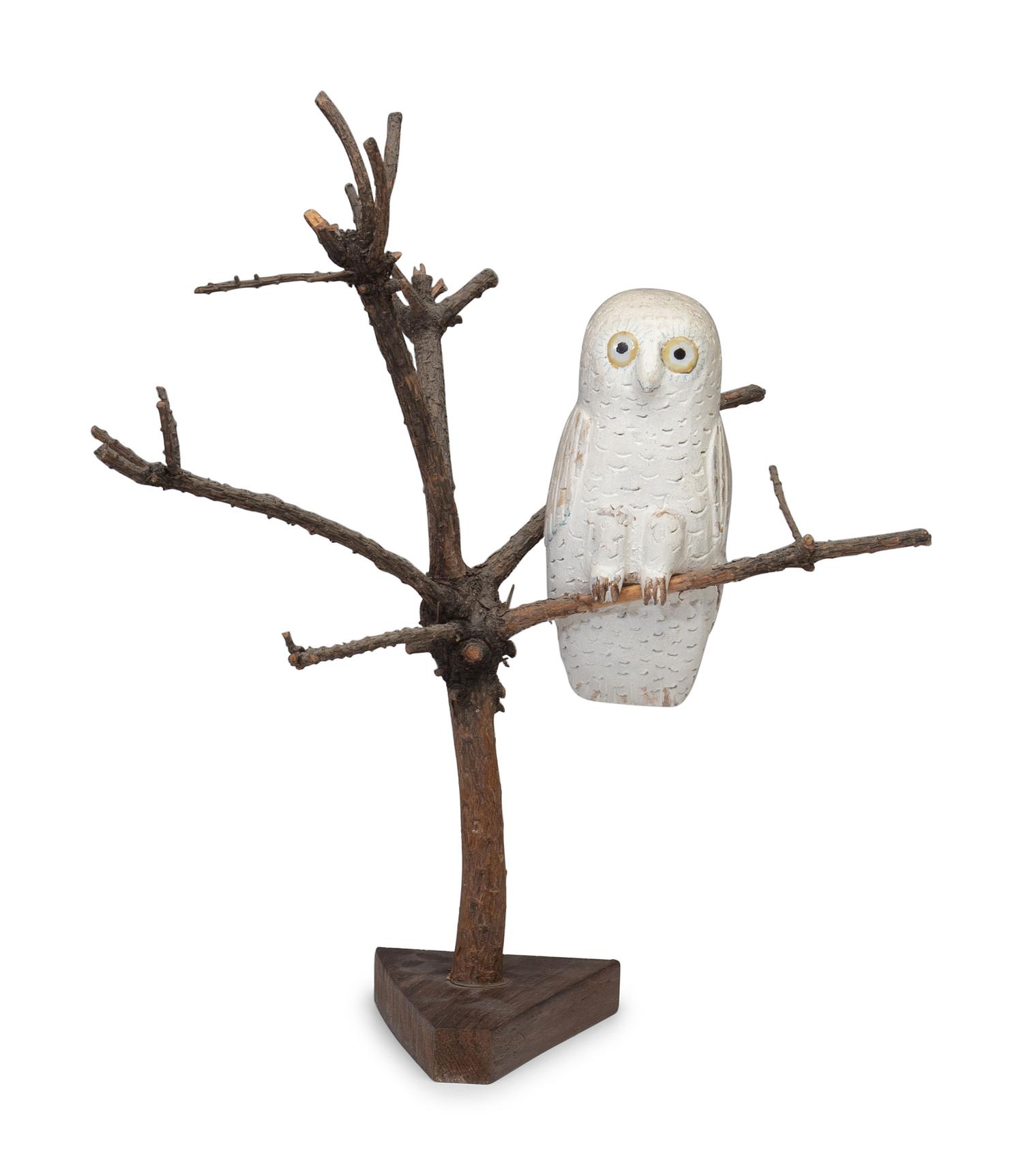 A Folk Art Carving of a Snowy Owl Perched in Tree