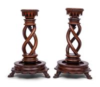 A Pair of Victorian Carved Walnut Candlesticks