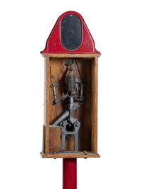 An Exhibit Supply Co. One Cent Striking Clock Game