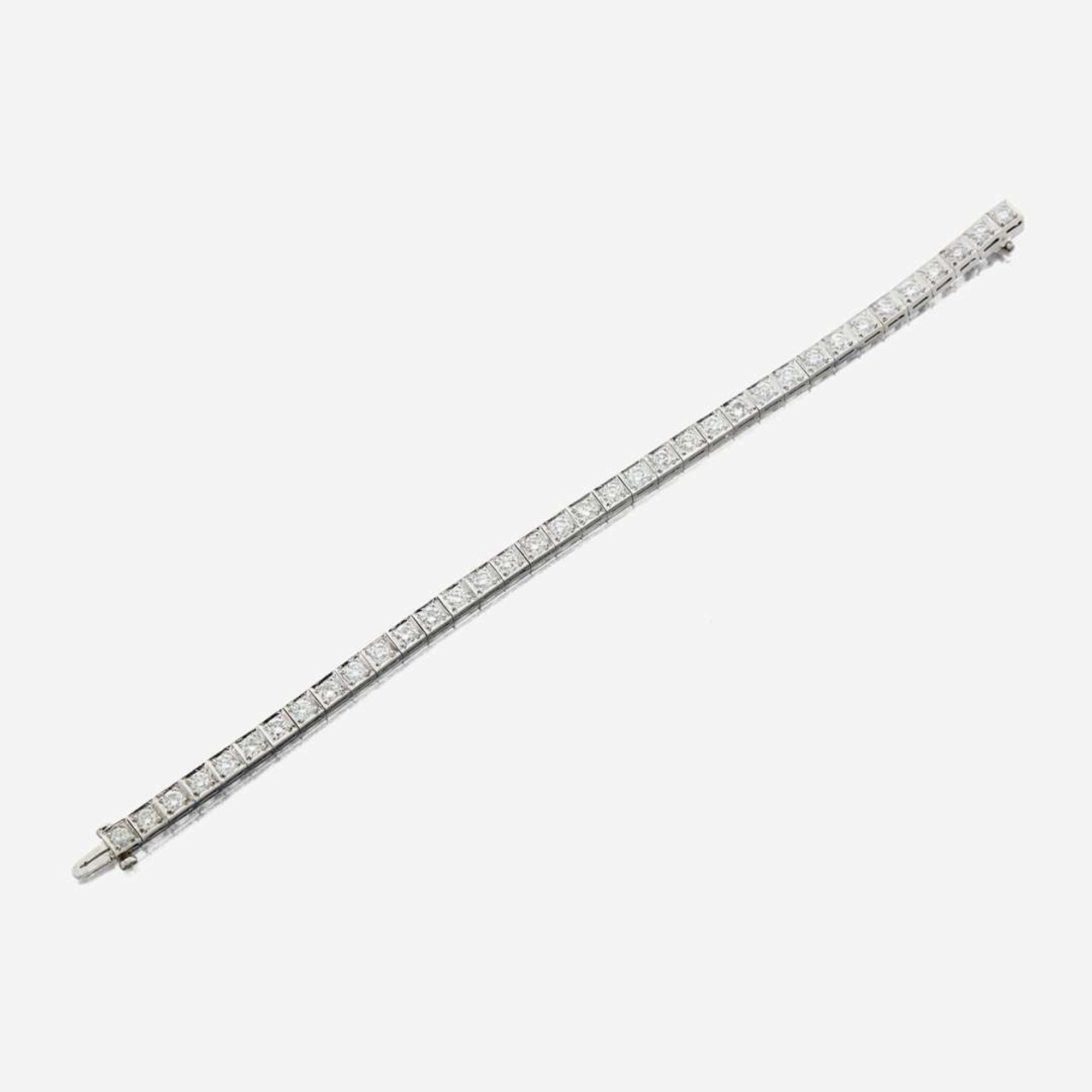 A diamond and platinum line bracelet