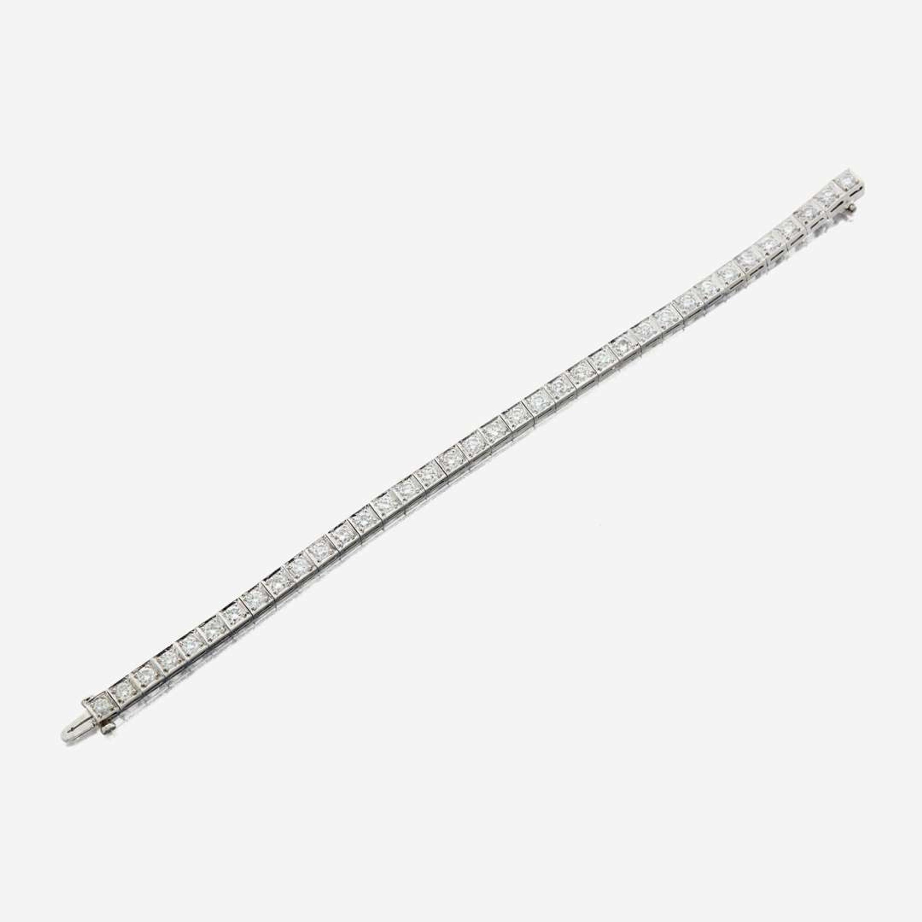 A diamond and platinum line bracelet