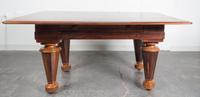 A Square Piano Retrofitted as a Table. Height 29 x width 63 3/4 x depth 46 3/4 inches.