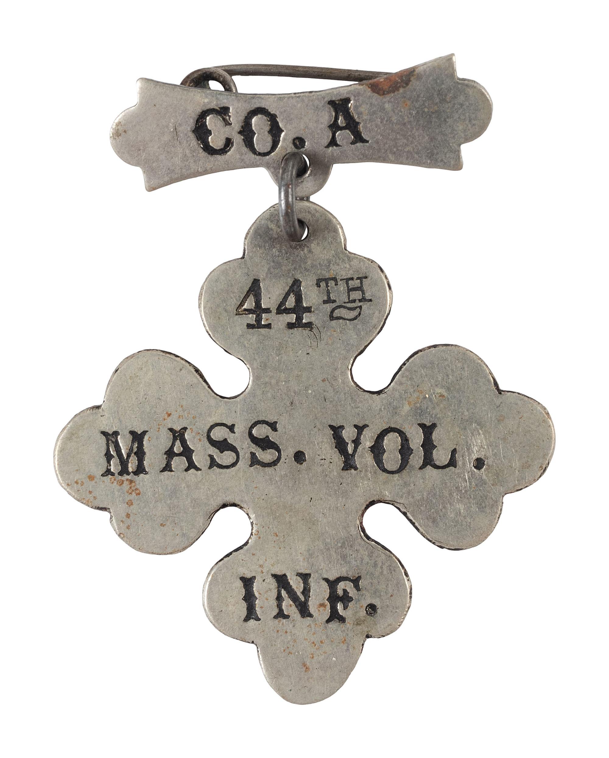 [CIVIL WAR]. Group incl. corps and ladder badges, 44th Massachusetts Infantry Regiment.
