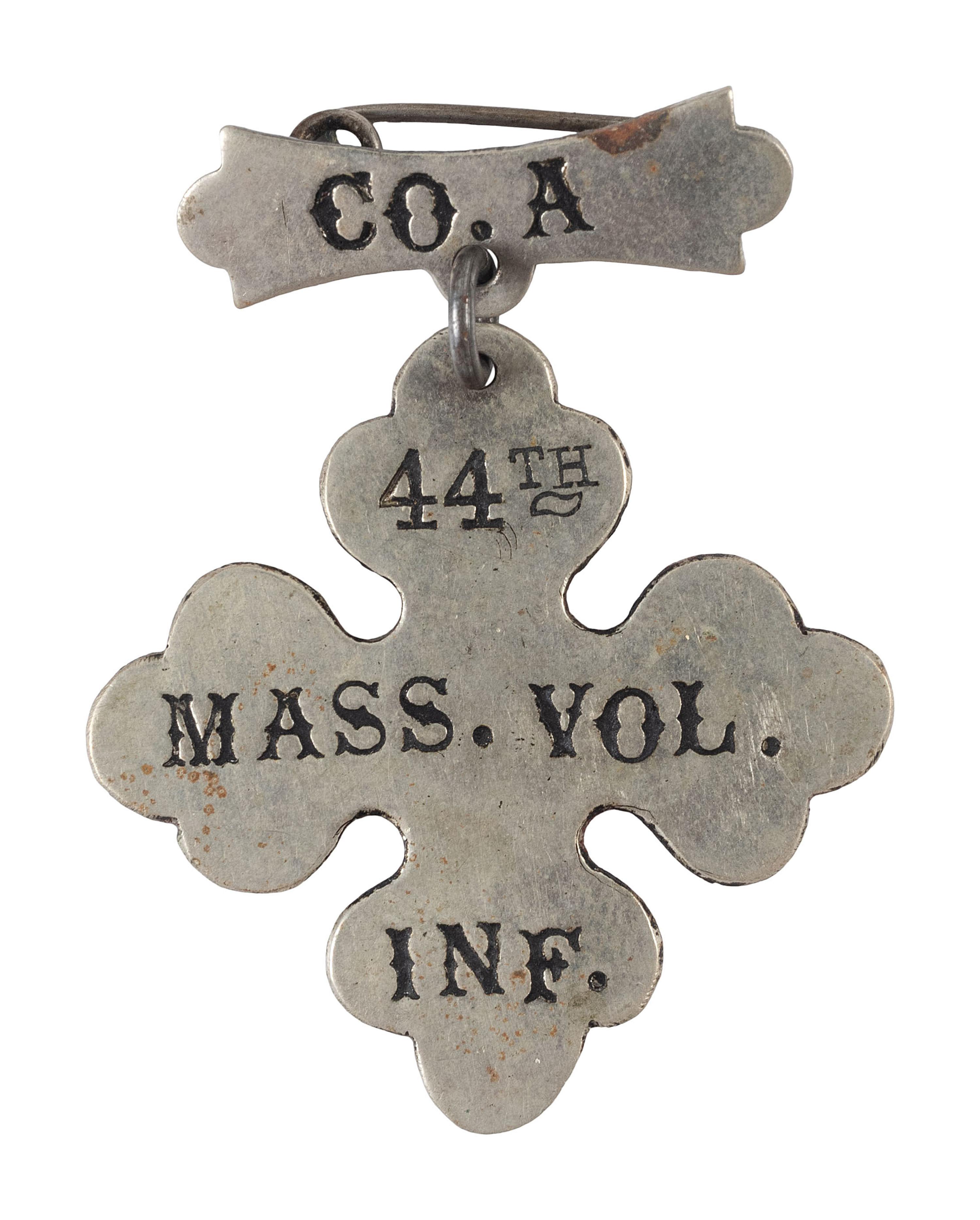[CIVIL WAR]. Group incl. corps and ladder badges, 44th Massachusetts Infantry Regiment.
